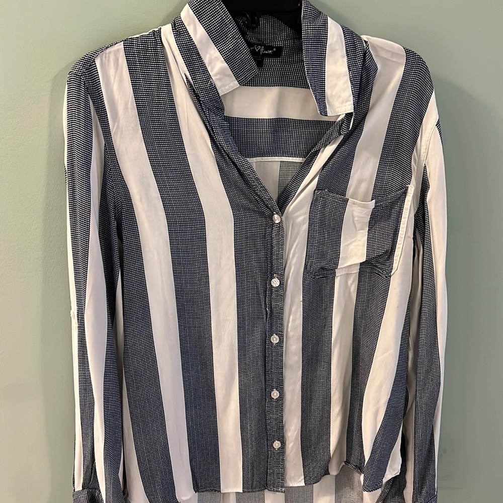 Woman’s striped long sleeved shirt